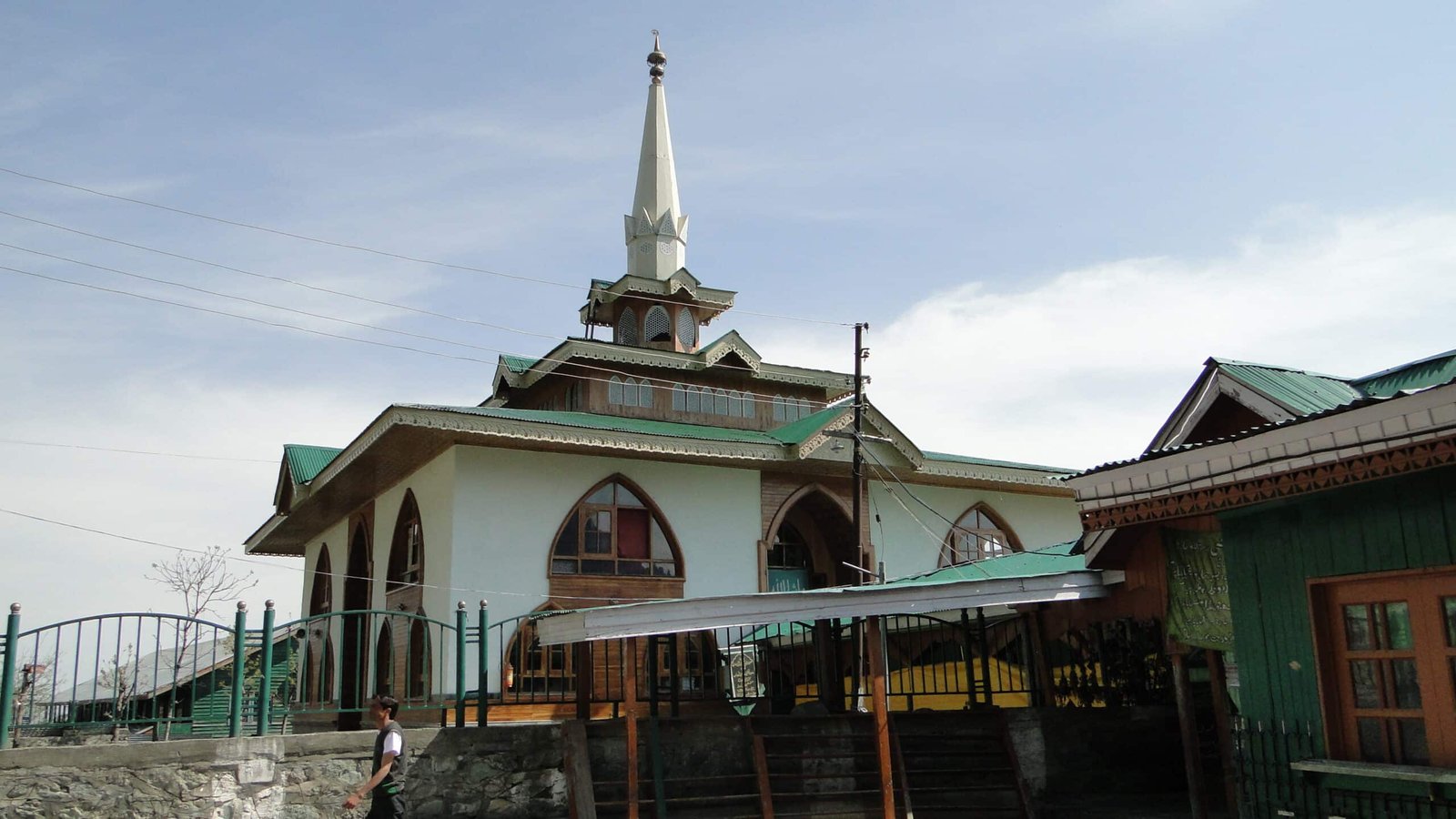 Baba Reshi Shrine with green roof and tall minaret in gulmarg