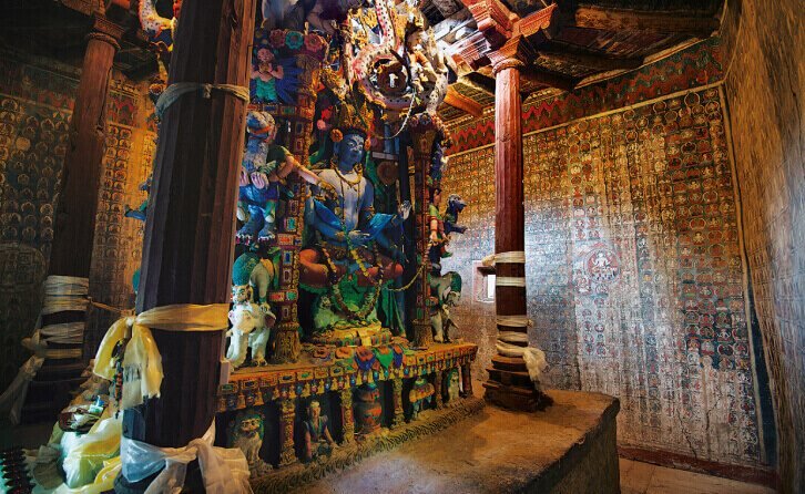 Colorful ancient statue inside Alchi Monastery, Ladakh.