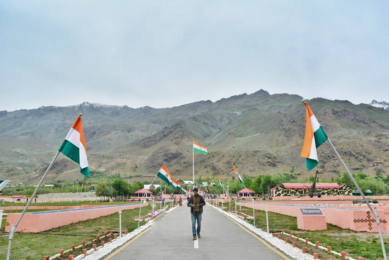 A visitor walks down the central pathway at the Kargil War Memorial in Drass
