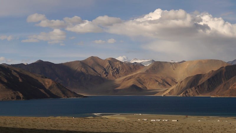 Scenic view of Pangong Lake with deep blue water