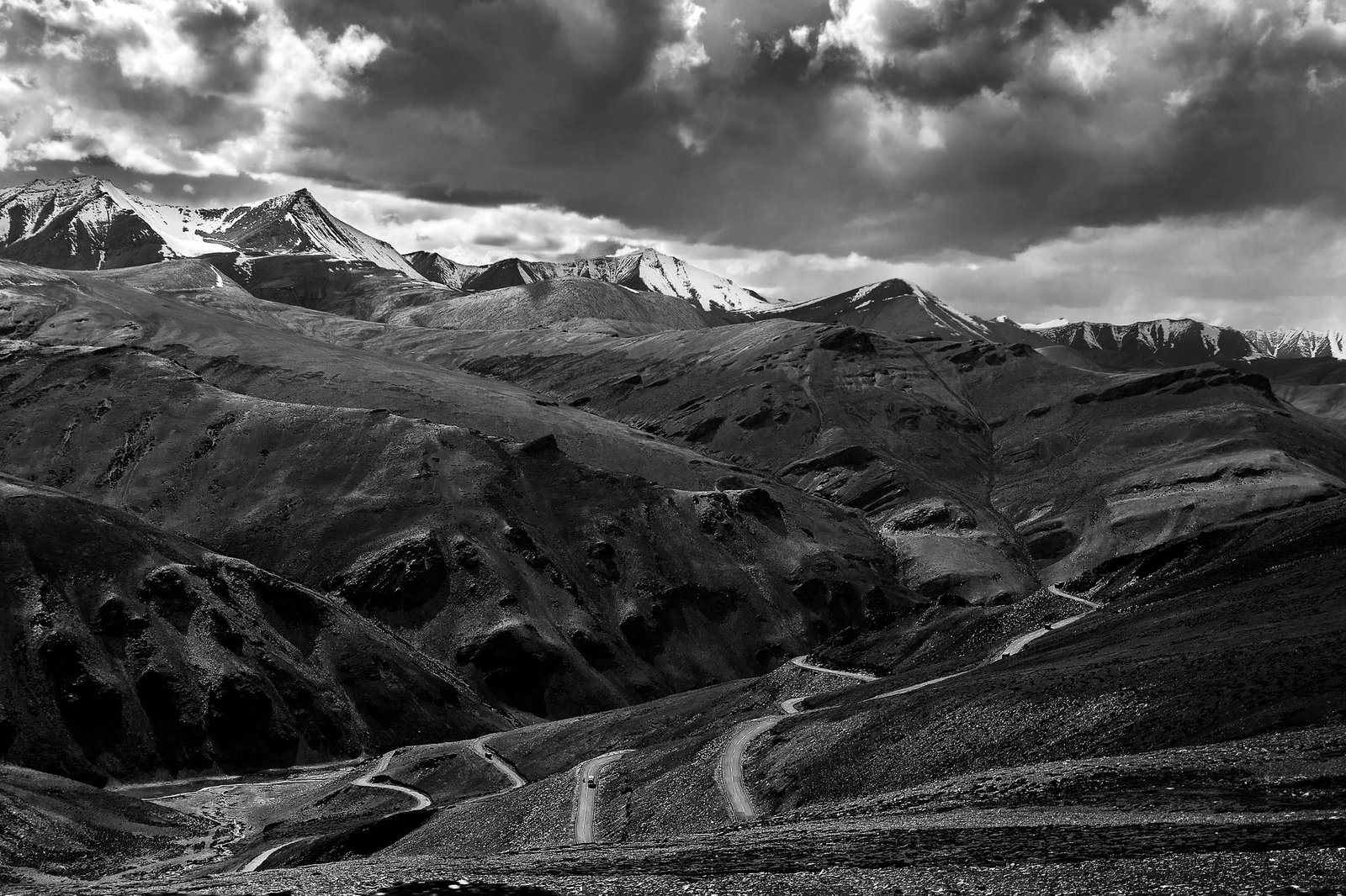 Black and white image of Tanglang La Pass showcasing rugged mountain terrain