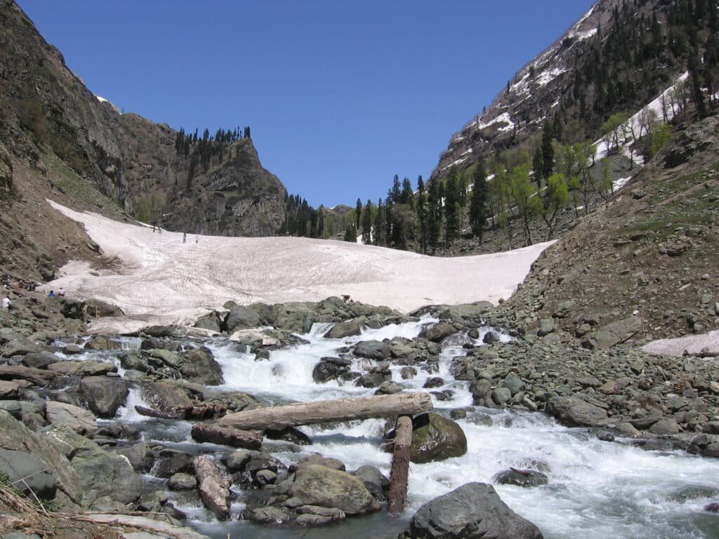 Lidder River flowing through rocky terrain with melting snow