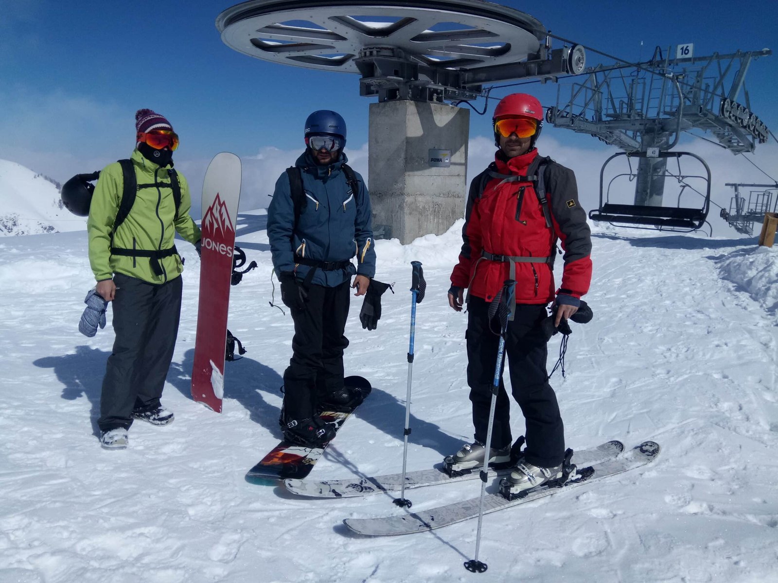 Skiers and snowboarders at Gulmarg gondola station in March