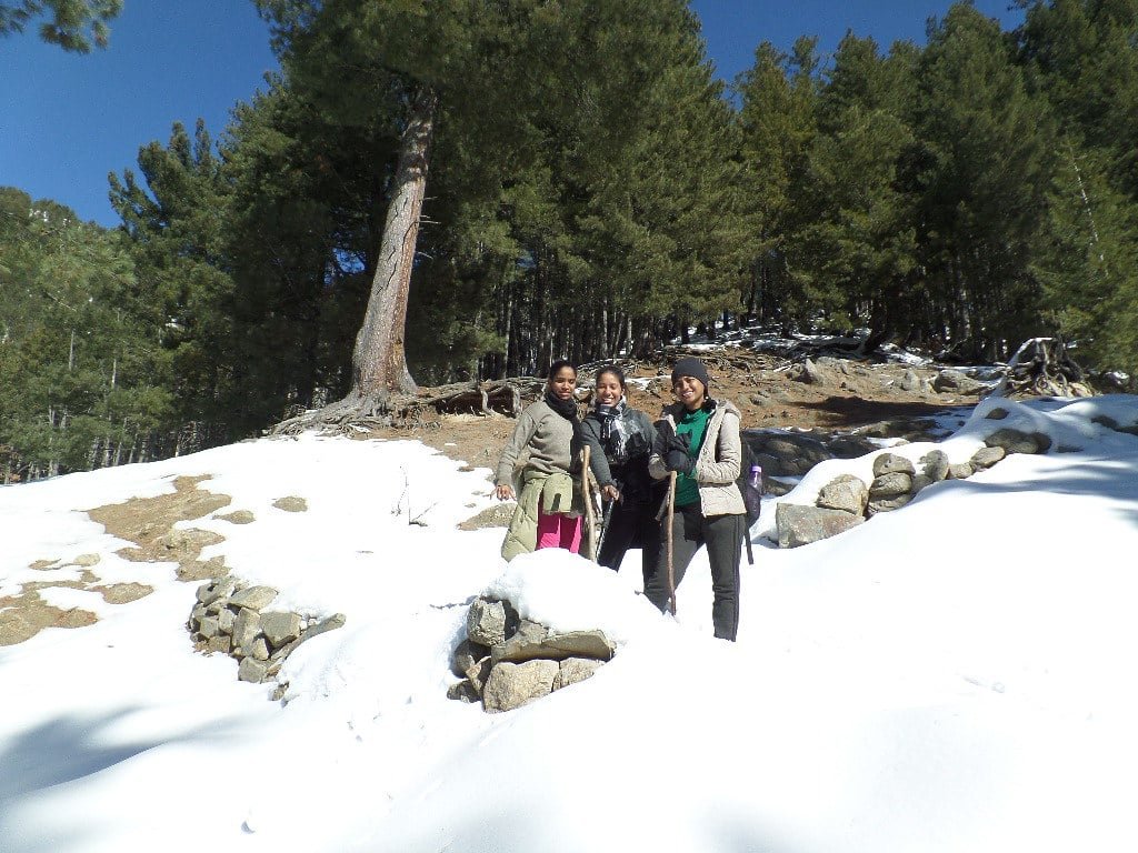 wearing Essential trekking clothes and posing for a picture