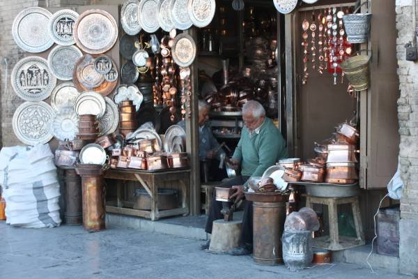 Kashmiri copperware shop showcasing handcrafted utensils