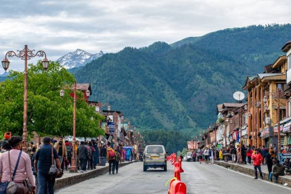 street of Pahalgam with vibrant markets and scenic mountain views