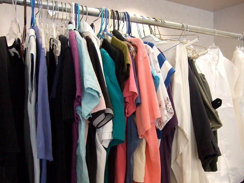 Colorful clothes hanging on a rack
