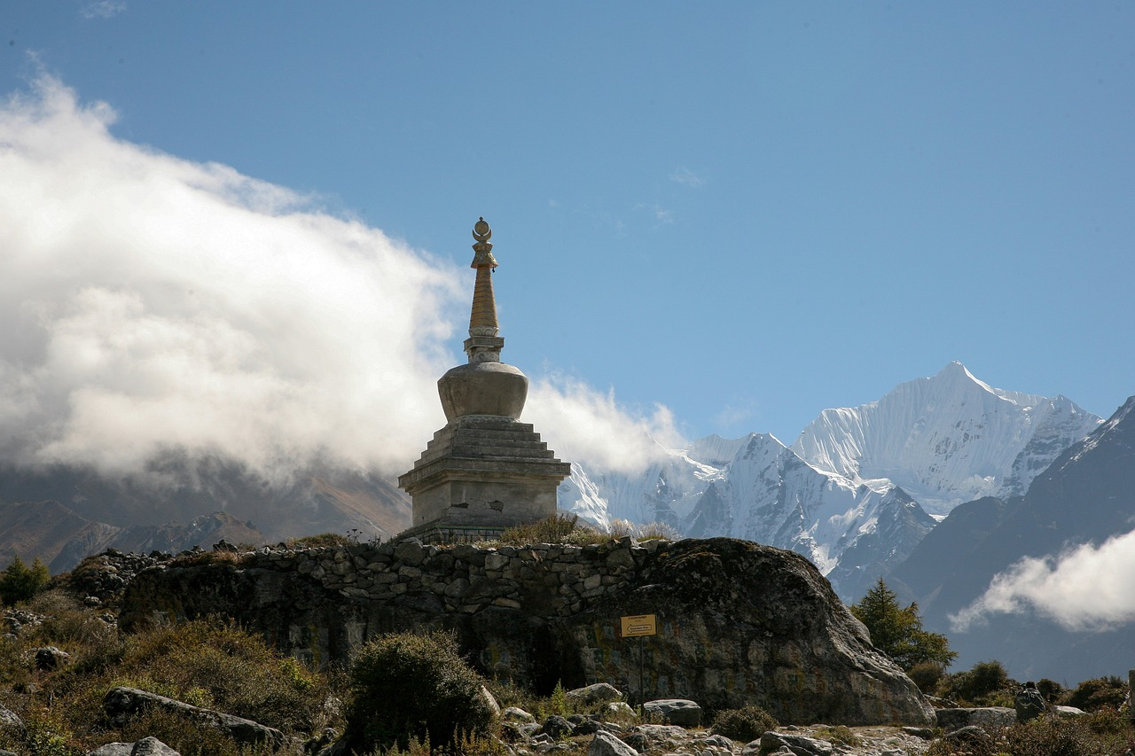 Stupa of Pibiting Gompa with snow-covered mountain in padum