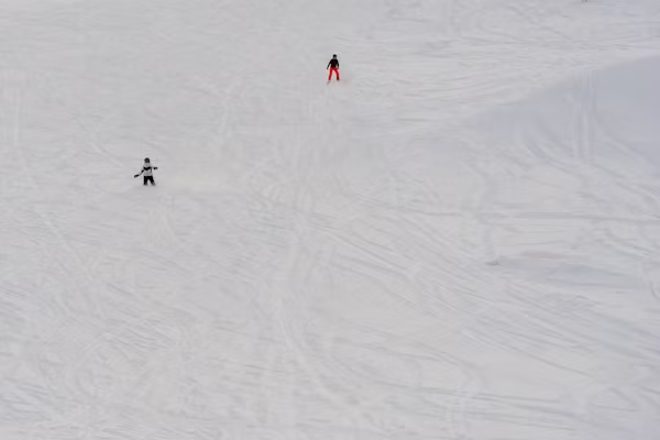 Two people are Skiing in Gulmarg snow slopes